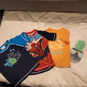 4 swim shirts Gently used